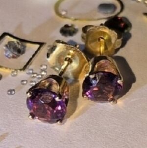1 Pair Of 14 K Amethyst Earrings & 1 Pair Of 10k Gold Star earrings,& 999 pair